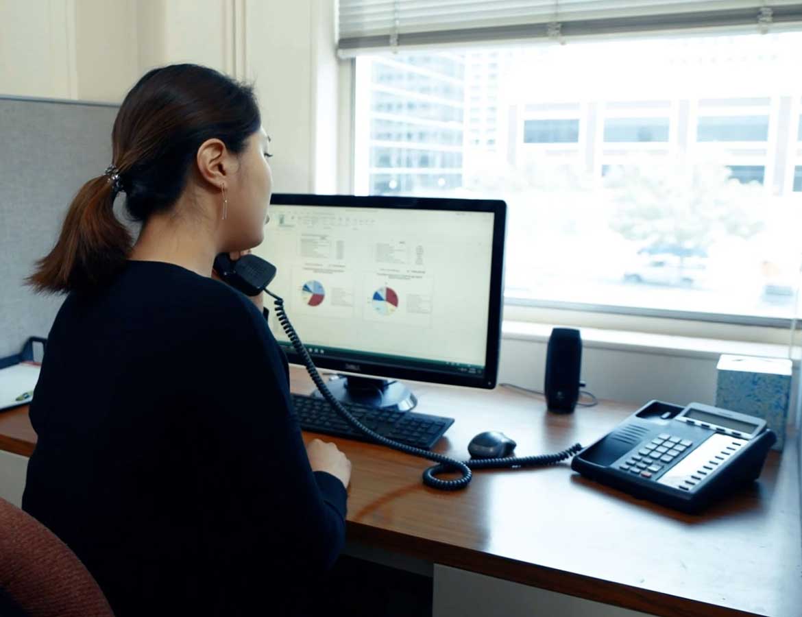 oklahoma-based voip representative talking on phone with client